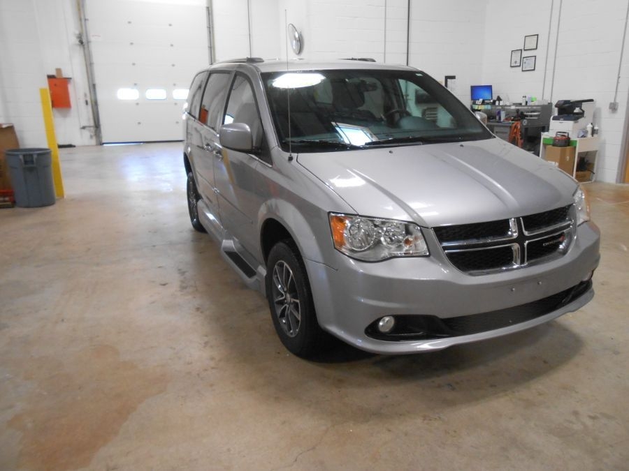 Silver Dodge Grand Caravan with Side Entry Automatic Fold Out ramp