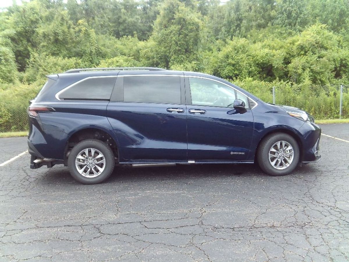 Blue Toyota Sienna with Rear Entry Manual Fold Out ramp