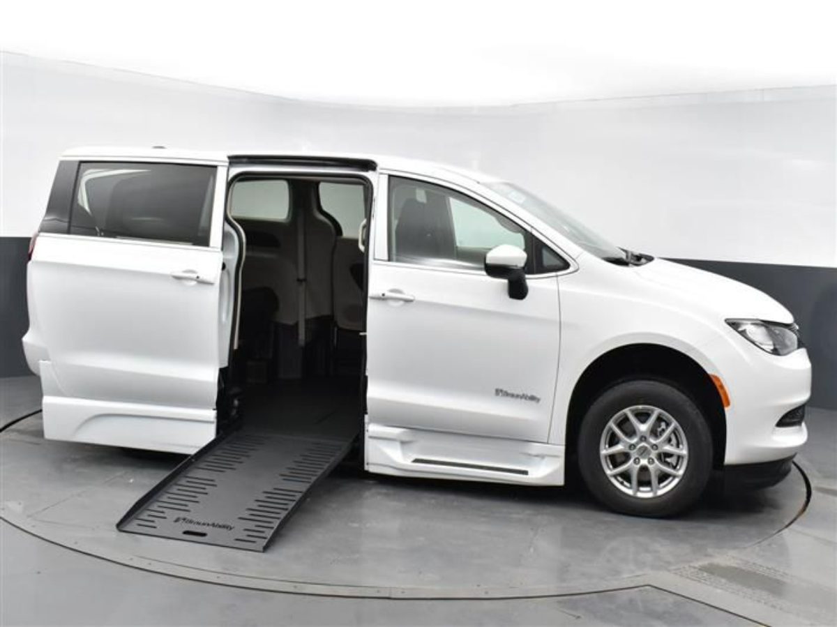 White Chrysler Voyager with Side Entry Automatic Fold Out ramp