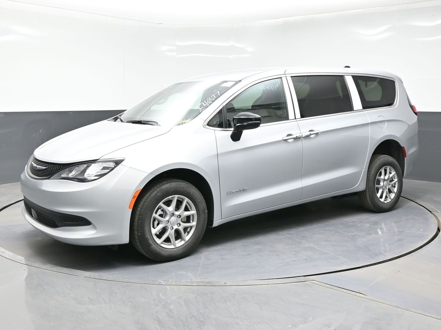 Silver Chrysler Voyager with Rear Entry Manual Fold Out ramp