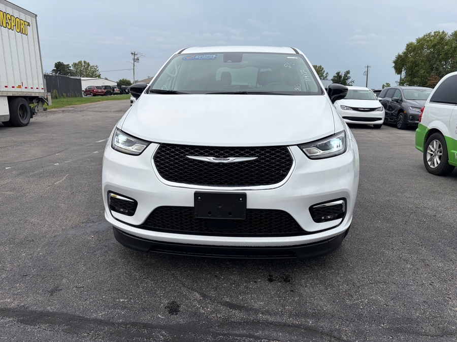 White Chrysler Pacifica with Side Entry Automatic Fold Out ramp