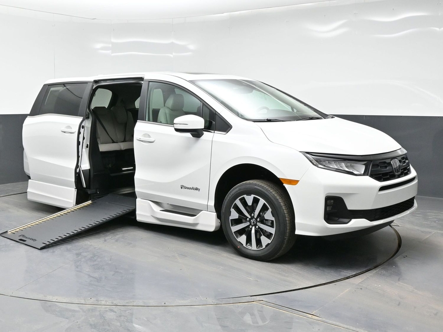 White Honda Odyssey with Side Entry Automatic In Floor ramp