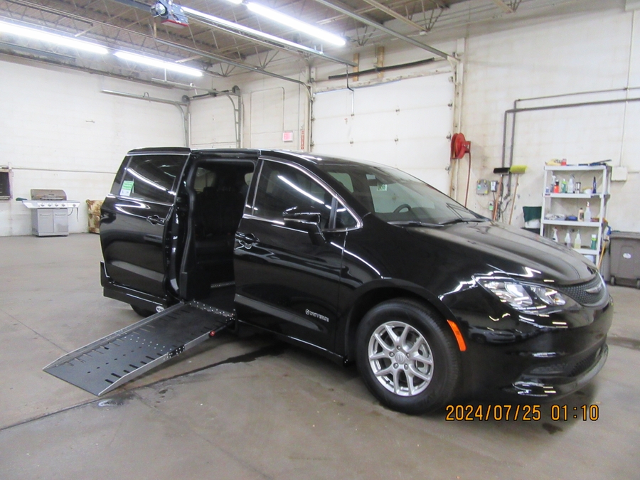 Black Chrysler Voyager with Side Entry Automatic Fold Out ramp