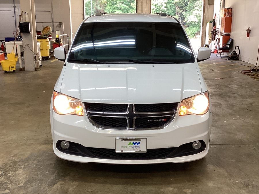 White Dodge Grand Caravan with Side Entry Automatic Fold Out ramp