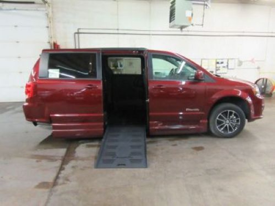 Red Dodge Grand Caravan with Side Entry Automatic Fold Out ramp