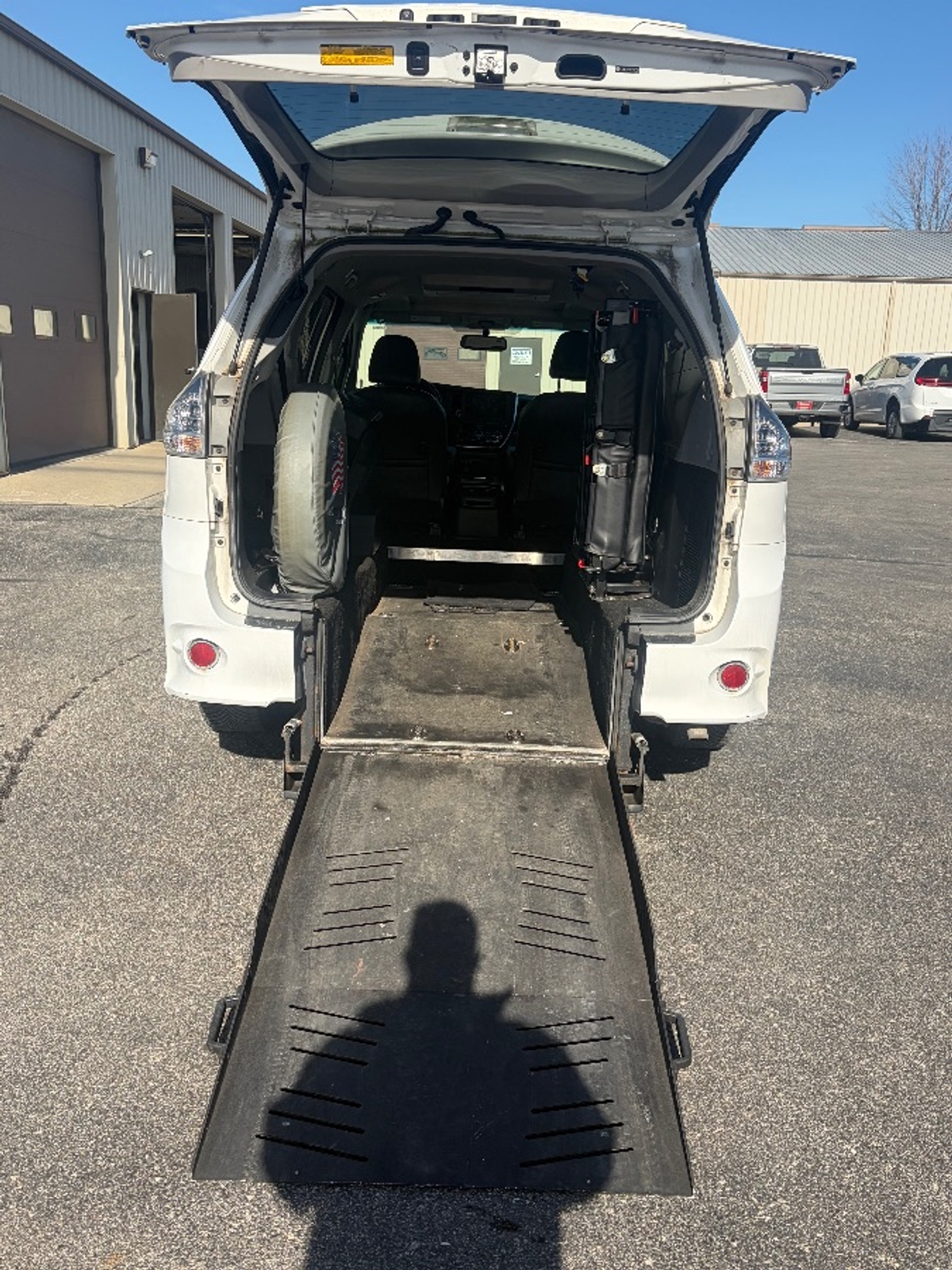 White Toyota Sienna with Rear Entry Manual Fold Out ramp