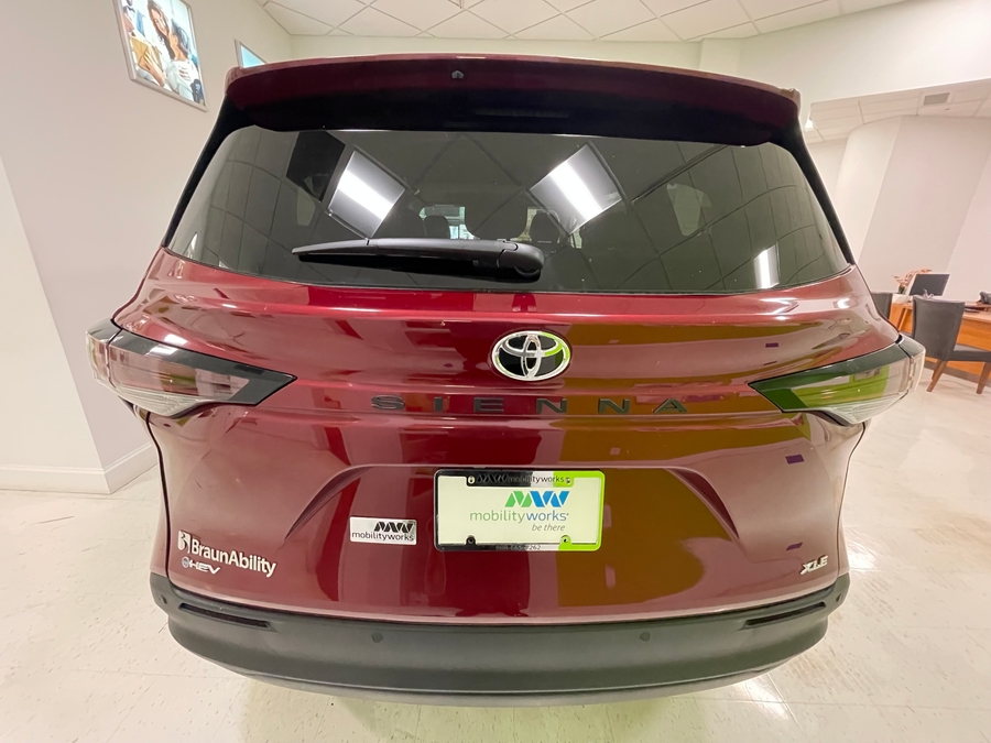 Red Toyota Sienna with Side Entry Automatic Fold Out ramp