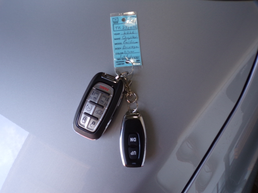 Silver Chrysler Pacifica with Side Entry Automatic Fold Out ramp