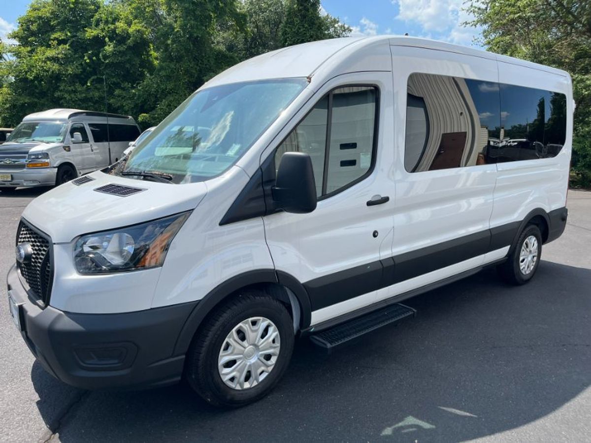 White Ford T350 with Rear Entry Automatic Fold Out ramp