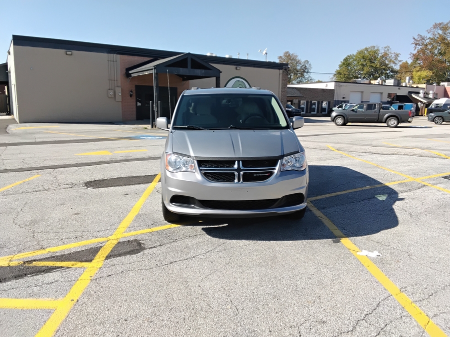 Silver Dodge Grand Caravan with Side Entry Automatic Fold Out ramp
