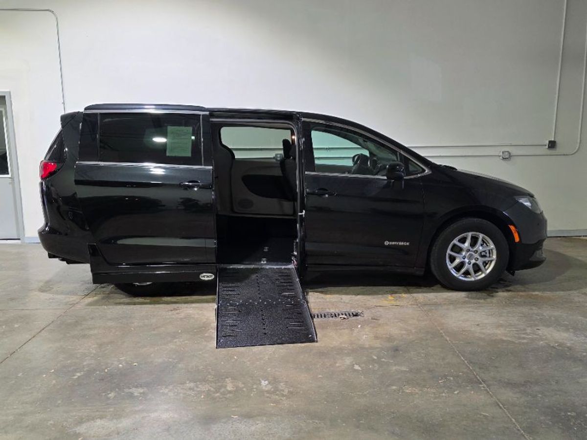 Black Chrysler Voyager with Side Entry Automatic Fold Out ramp
