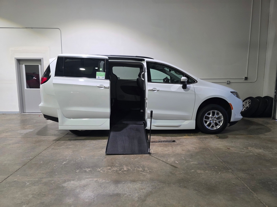 White Chrysler Voyager with Side Entry Manual In Floor ramp