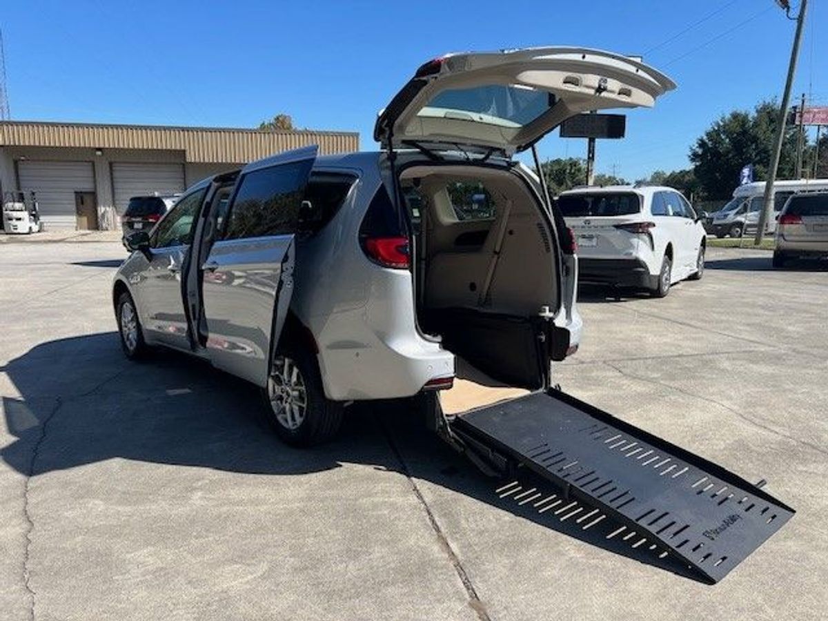 Silver Chrysler Pacifica with Rear Entry Manual Fold Out ramp