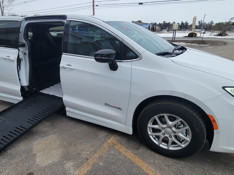 White Chrysler Pacifica with Side Entry Automatic Fold Out ramp