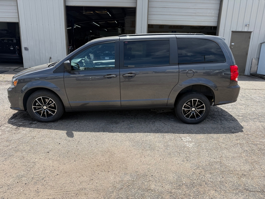 Grey Dodge Grand Caravan with Side Entry Automatic Fold Out ramp