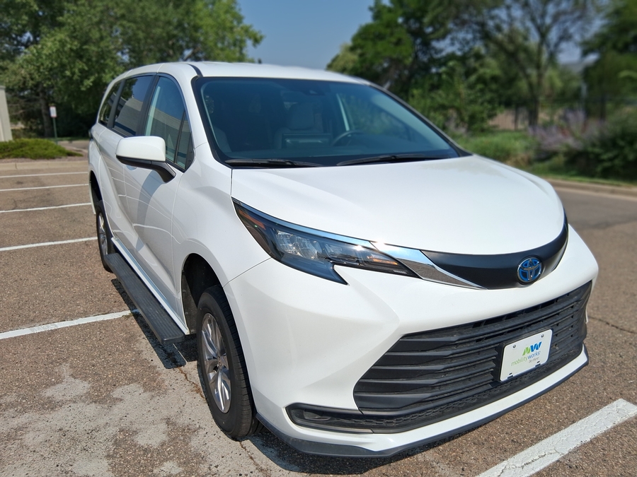 White Toyota Sienna with Rear Entry Manual Fold Out ramp