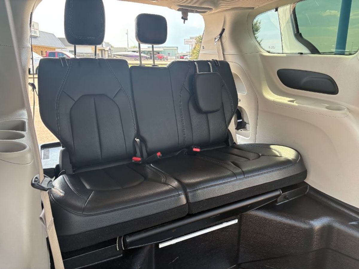 White Chrysler Pacifica with Side Entry Automatic In Floor ramp