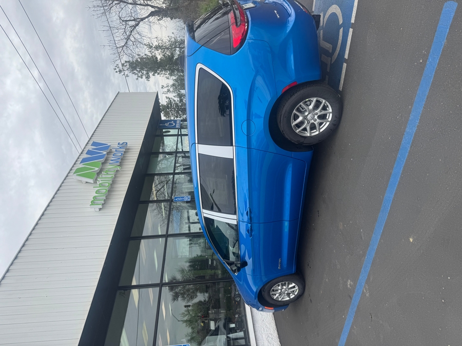 Blue Chrysler Pacifica with Side Entry Automatic Fold Out ramp