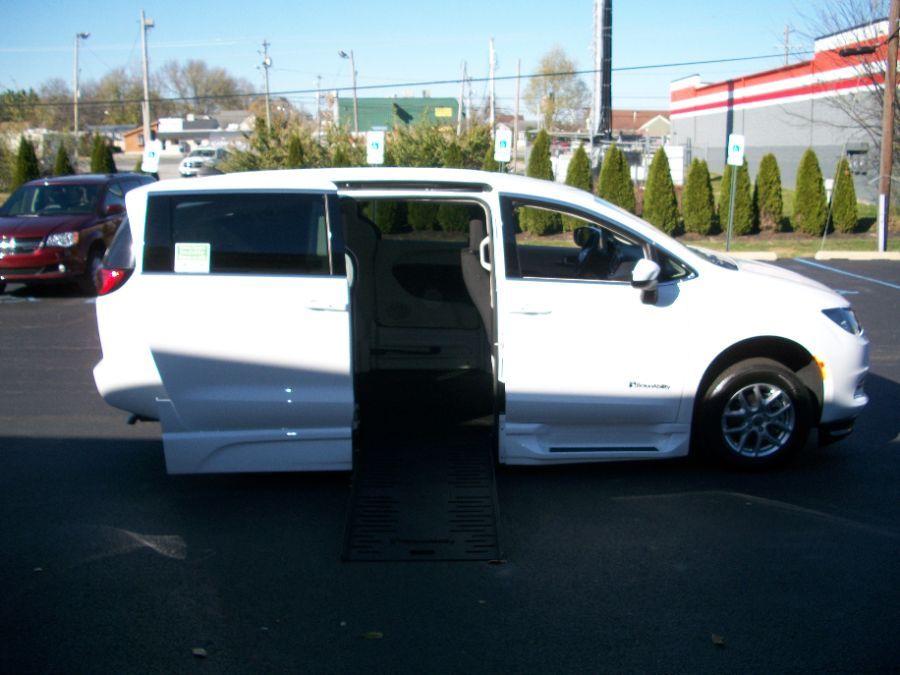 White Chrysler Voyager with Side Entry Automatic Fold Out ramp