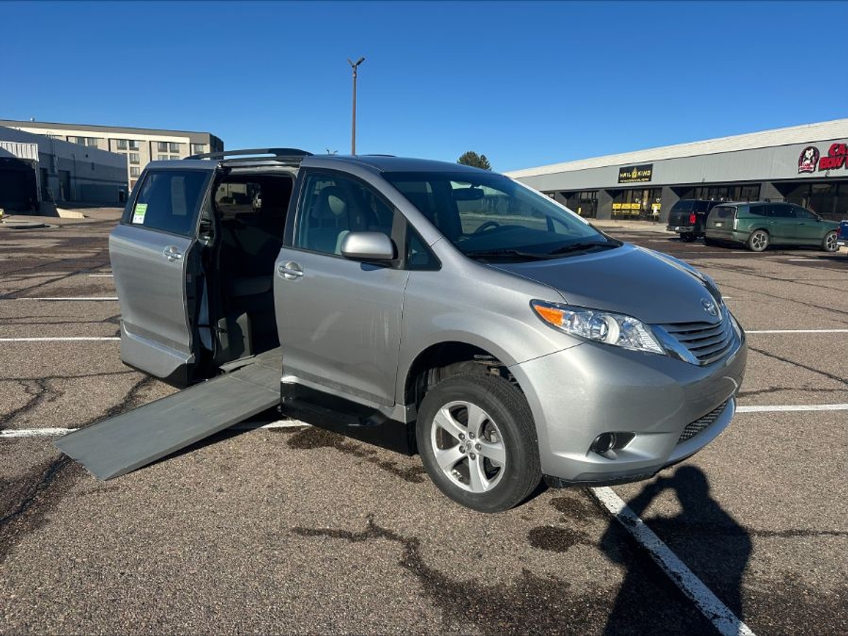 Silver Toyota Sienna with Side Entry Automatic In Floor ramp