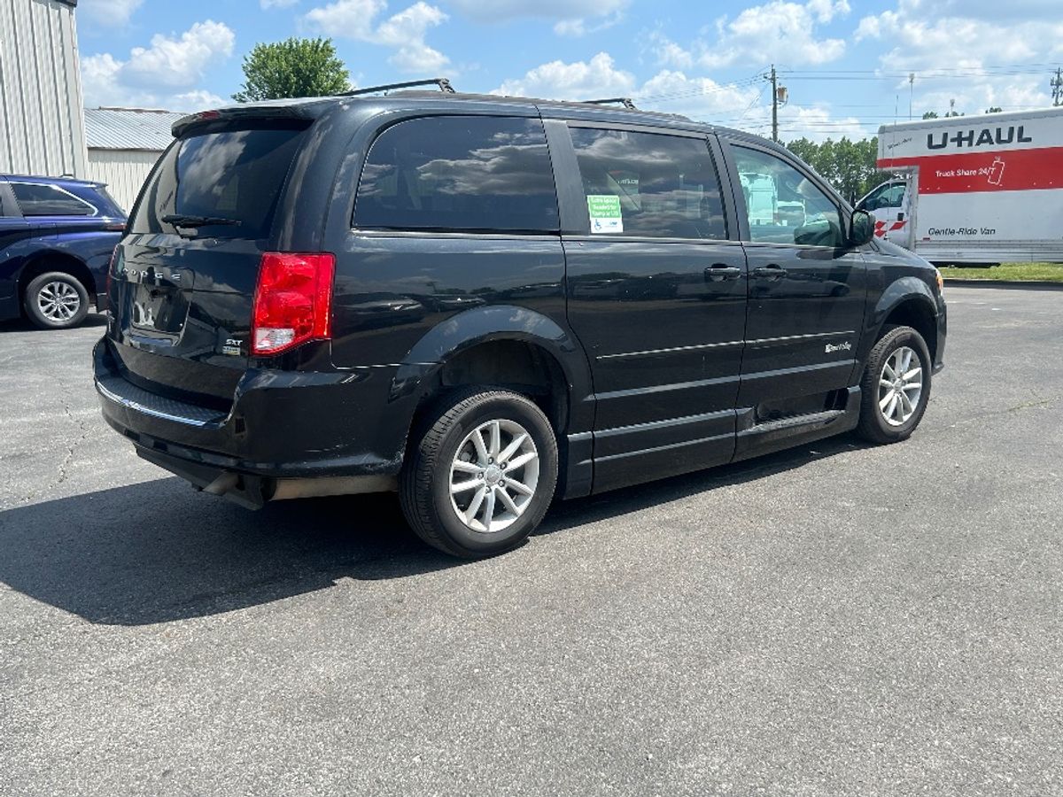 Black Dodge Grand Caravan image number 7