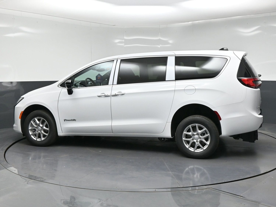 White Chrysler Pacifica with Rear Entry Manual Fold Out ramp