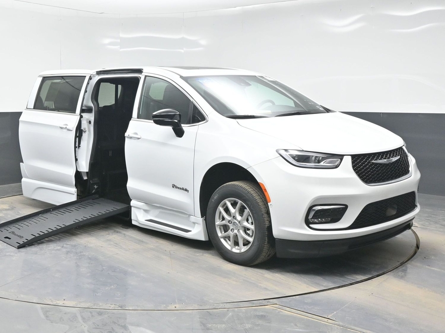 White Chrysler Pacifica with Side Entry Automatic Fold Out ramp