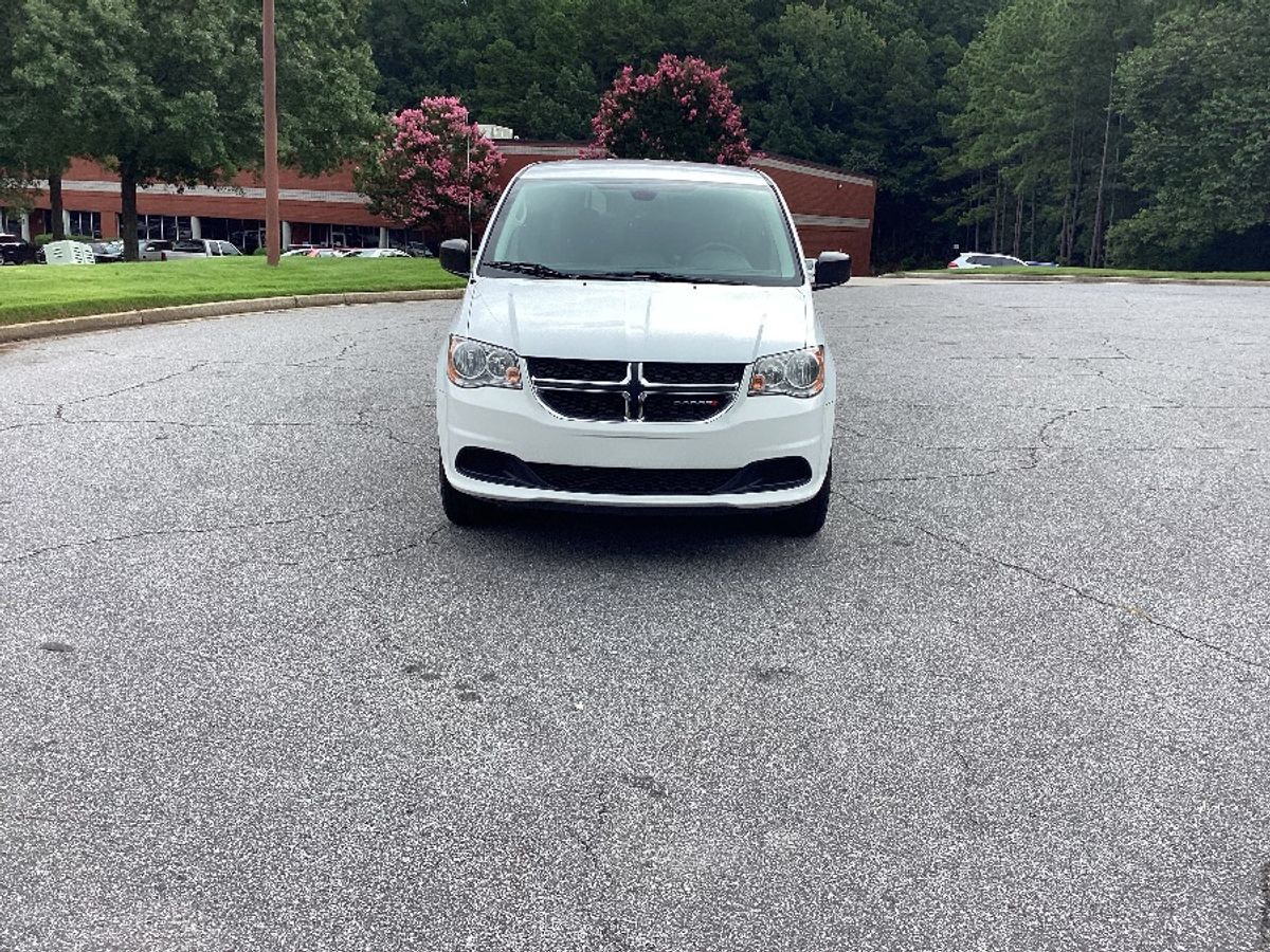 White Dodge Grand Caravan image number 1