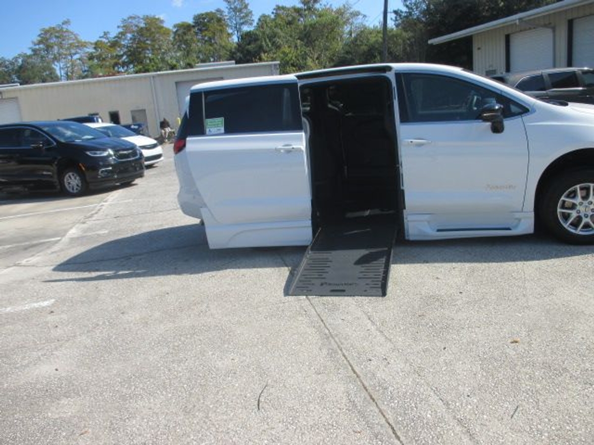 White Chrysler Pacifica with Side Entry Automatic Fold Out ramp