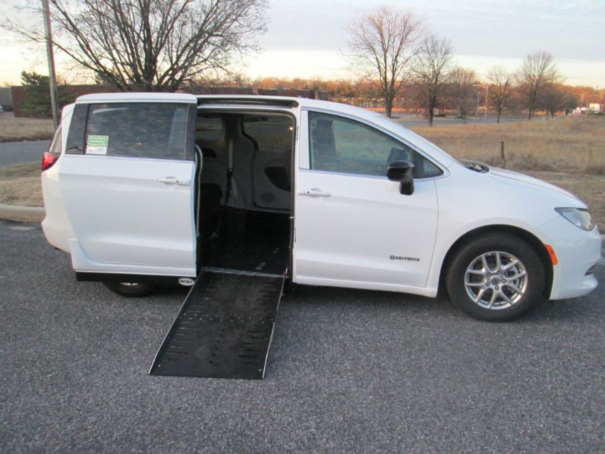 White Chrysler Voyager with Side Entry Automatic Fold Out ramp