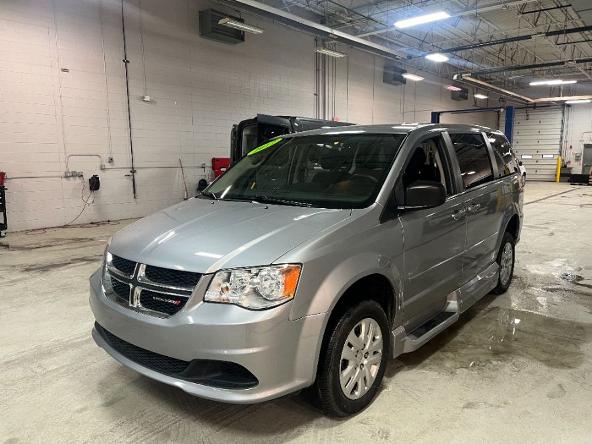 Silver Dodge Grand Caravan image number 1