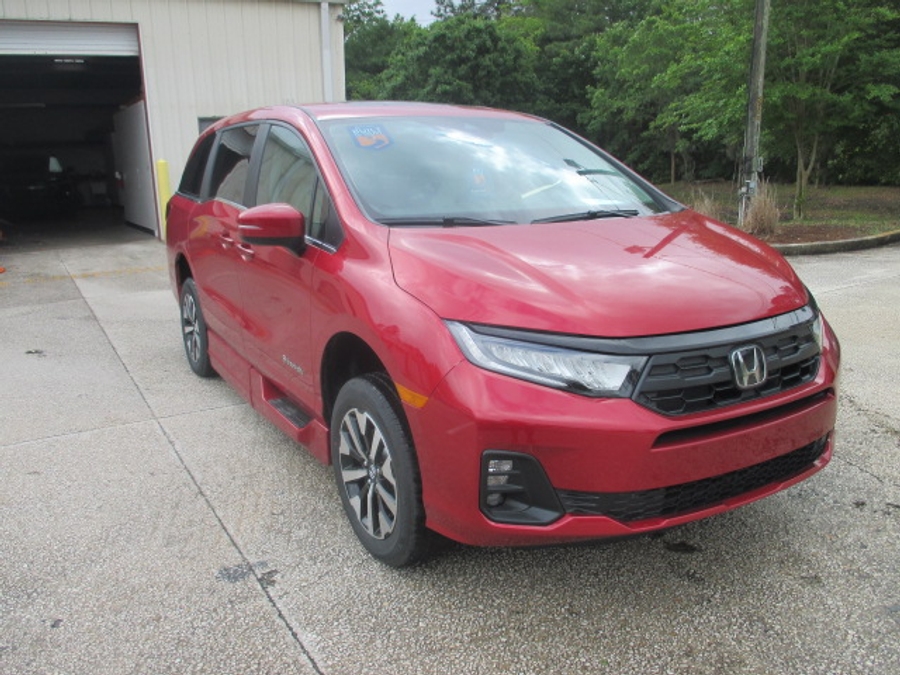 Red Honda Odyssey image number 2