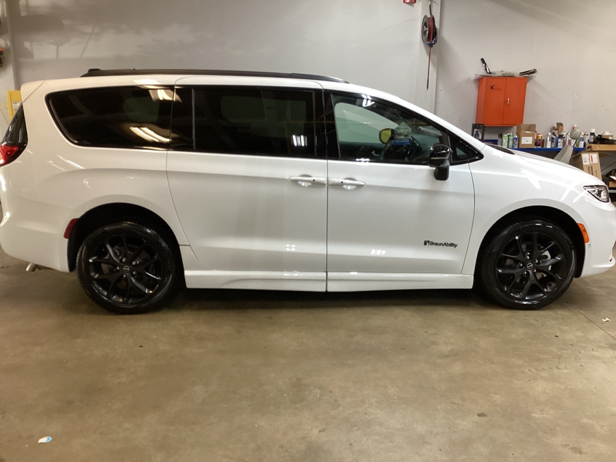 White Chrysler Pacifica with Side Entry Automatic Fold Out ramp