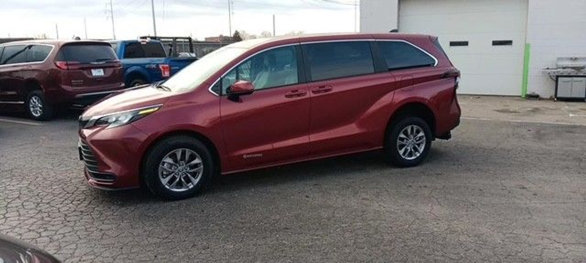 Red Toyota Sienna with Rear Entry Manual Fold Out ramp