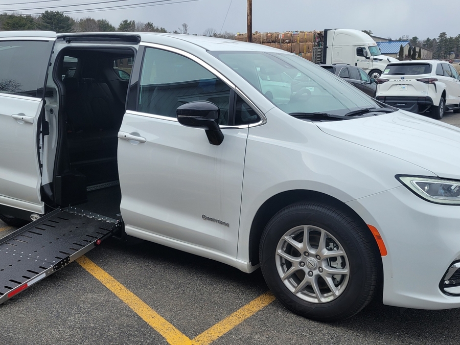White Chrysler Pacifica with Side Entry Automatic Fold Out ramp