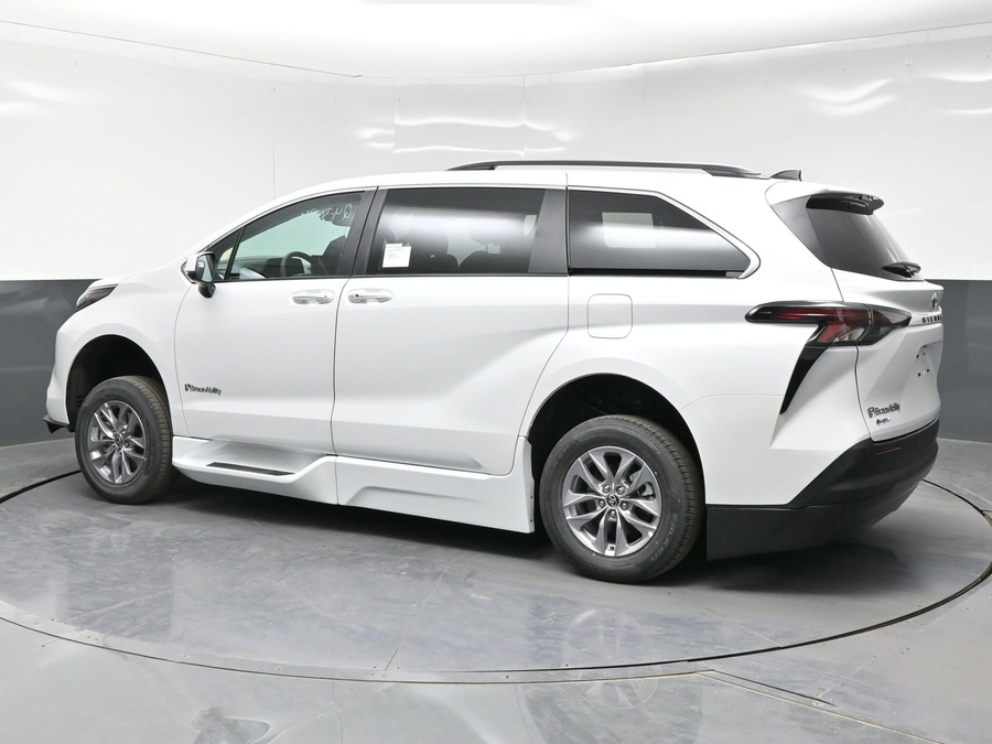 White Toyota Sienna with Side Entry Automatic Fold Out ramp