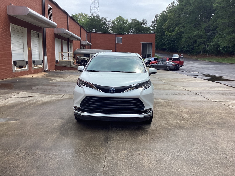 White Toyota Sienna with Side Entry Automatic Fold Out ramp