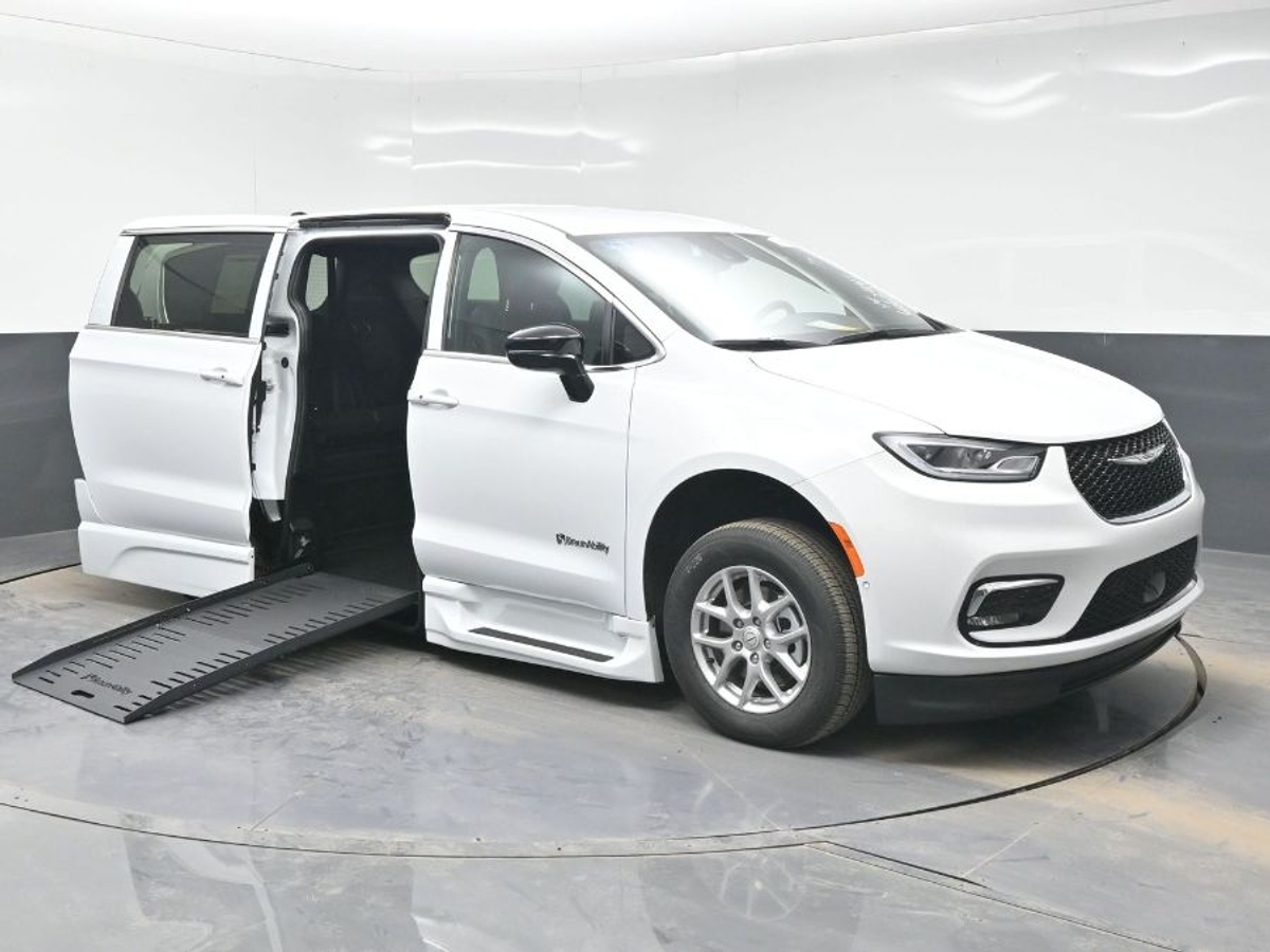 White Chrysler Pacifica with Side Entry Automatic Fold Out ramp