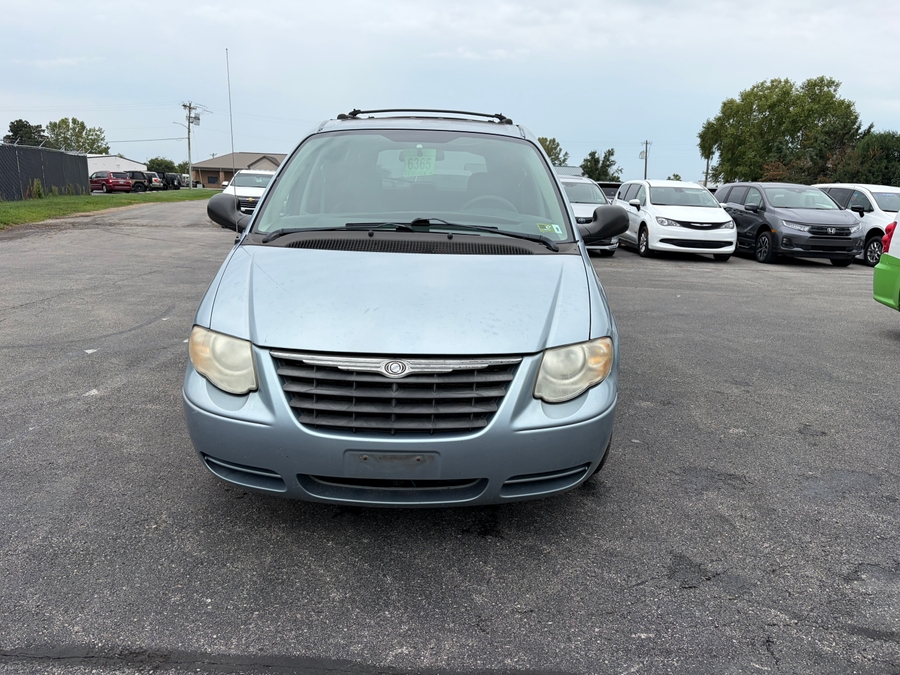 Blue Chrysler Town and Country with Rear Entry Manual Fold Out ramp