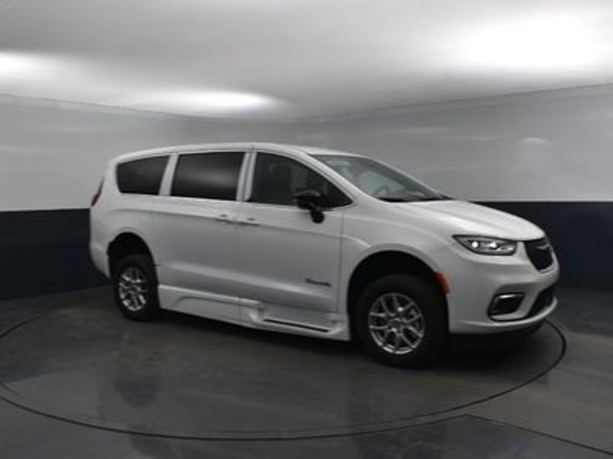 White Chrysler Pacifica with Rear Entry Manual Fold Out ramp