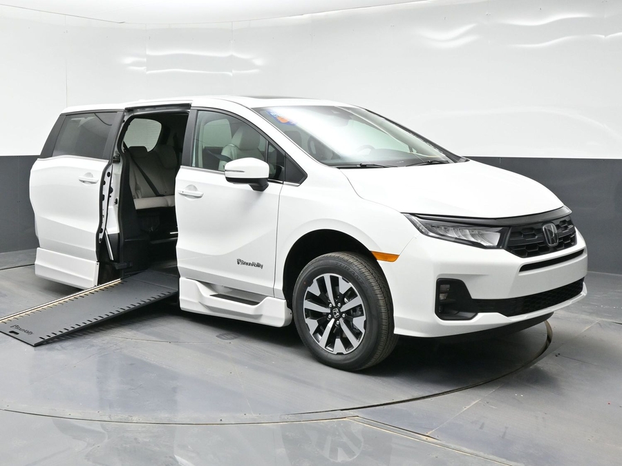 White Honda Odyssey with Side Entry Automatic In Floor ramp