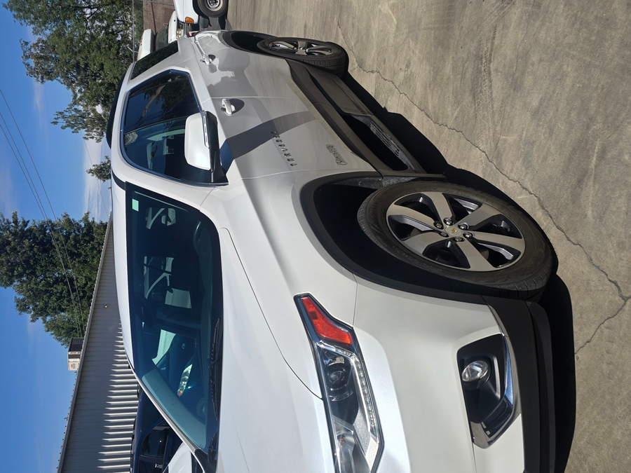 White Chevrolet Traverse with Side Entry Automatic In Floor ramp