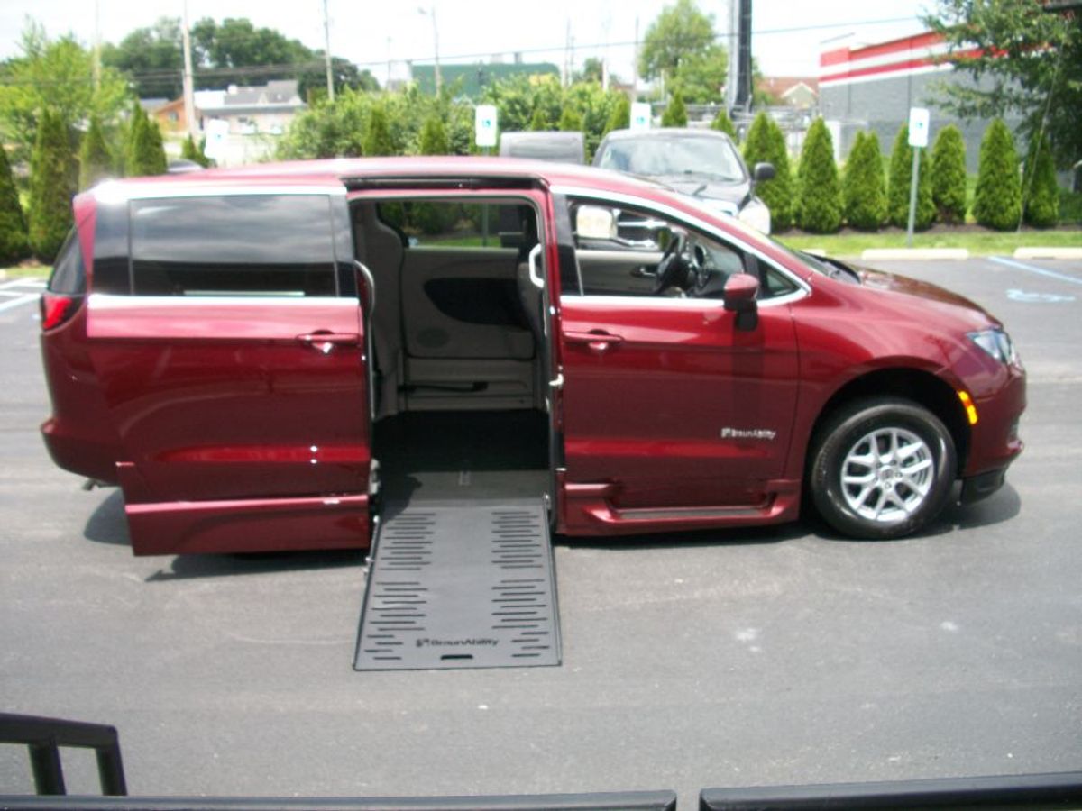 Red Chrysler Voyager with Side Entry Automatic Fold Out ramp