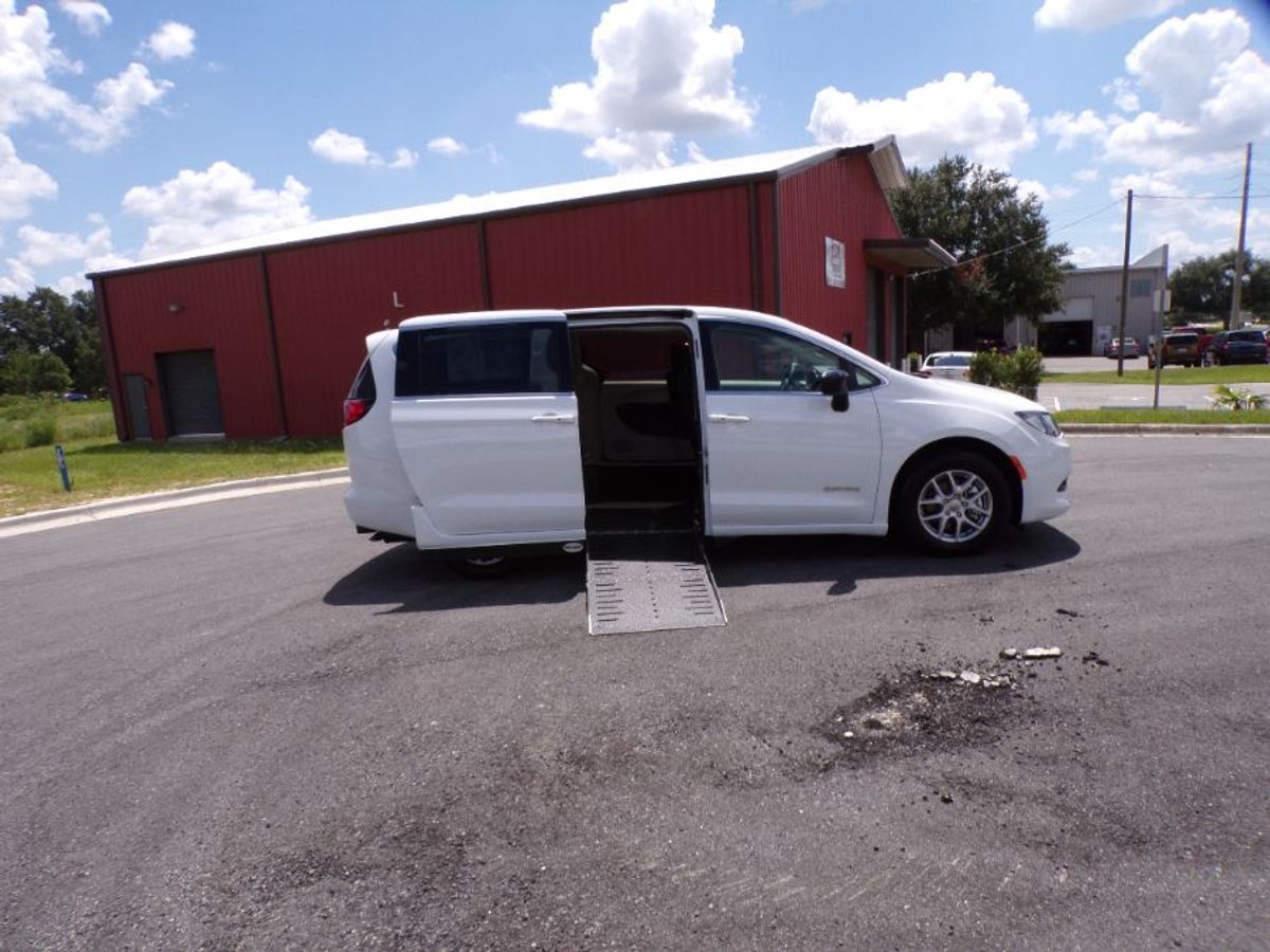 White Chrysler Voyager with Side Entry Automatic Fold Out ramp