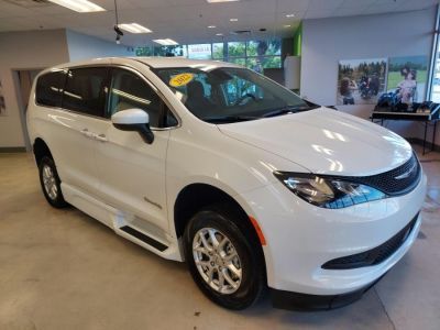 White Chrysler Voyager with Side Entry Automatic Fold Out ramp