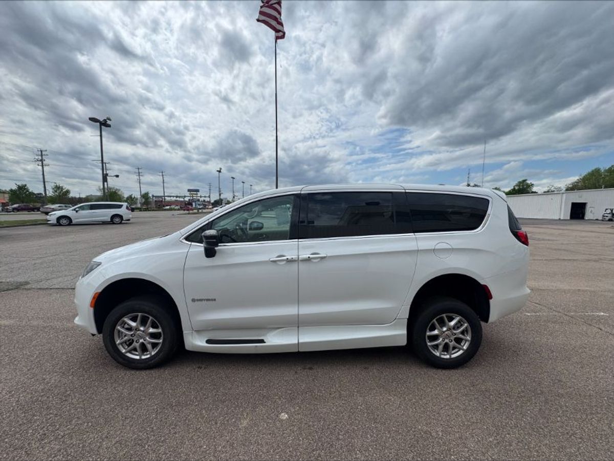 White Chrysler Voyager with Side Entry Automatic Fold Out ramp