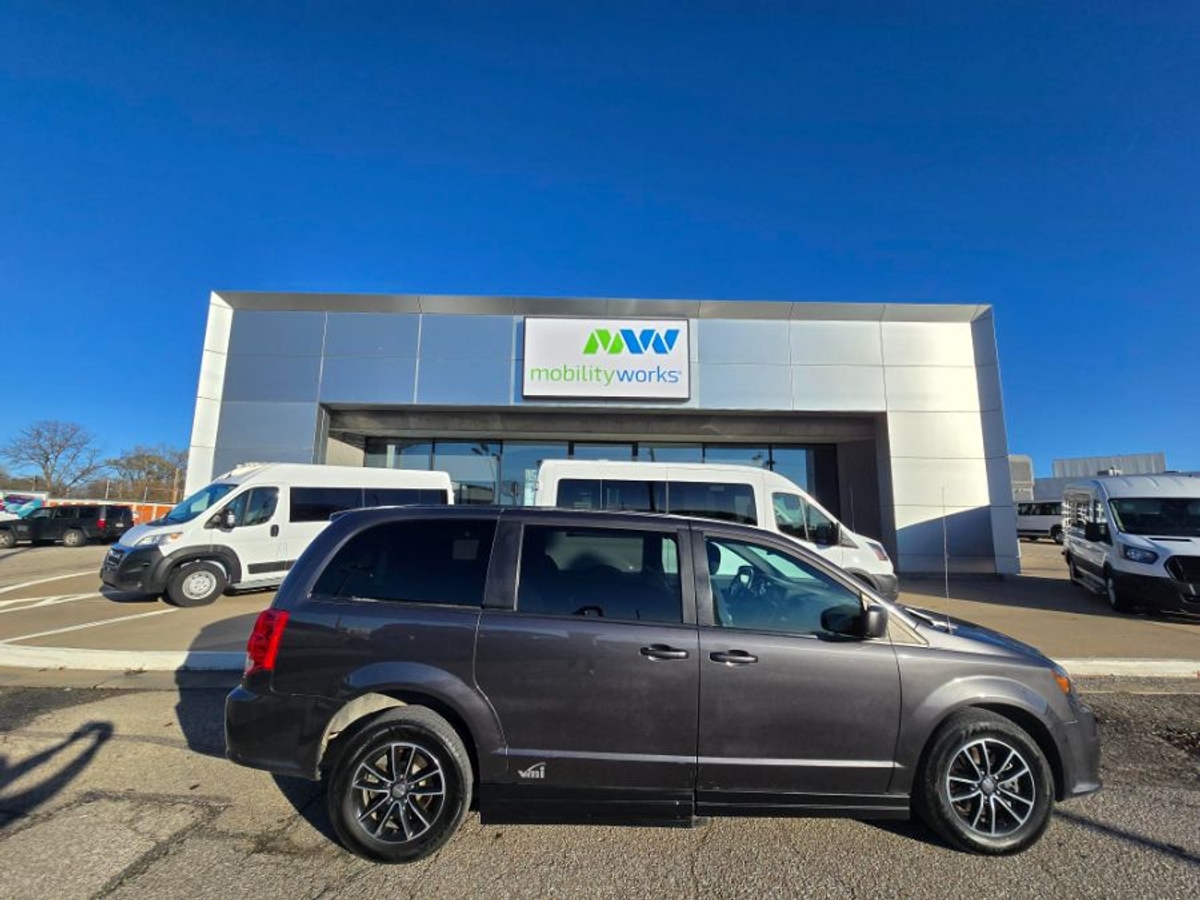 Grey Dodge Grand Caravan with Side Entry Automatic In Floor ramp