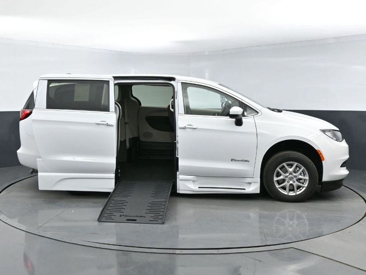 White Chrysler Voyager with Side Entry Automatic Fold Out ramp