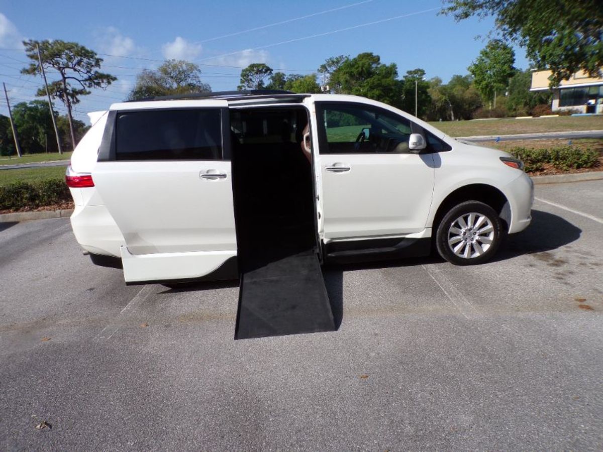 White Toyota Sienna with Side Entry Automatic In Floor ramp