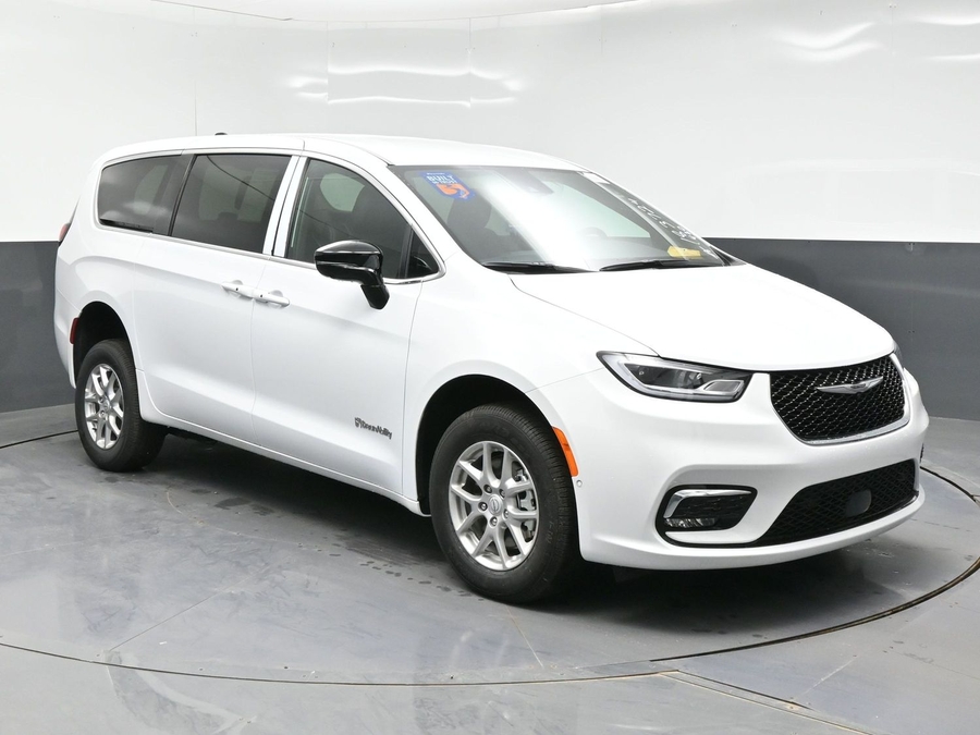 White Chrysler Pacifica with Rear Entry Manual Fold Out ramp